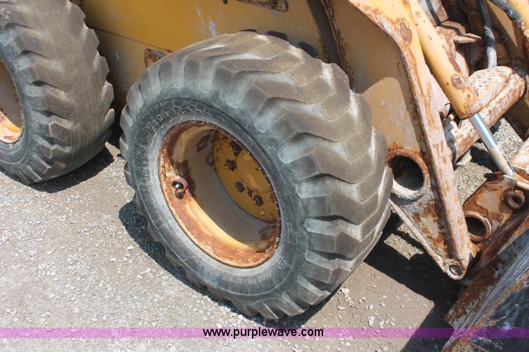 image for item I7837 2000 John Deere 260 Series II skid steer