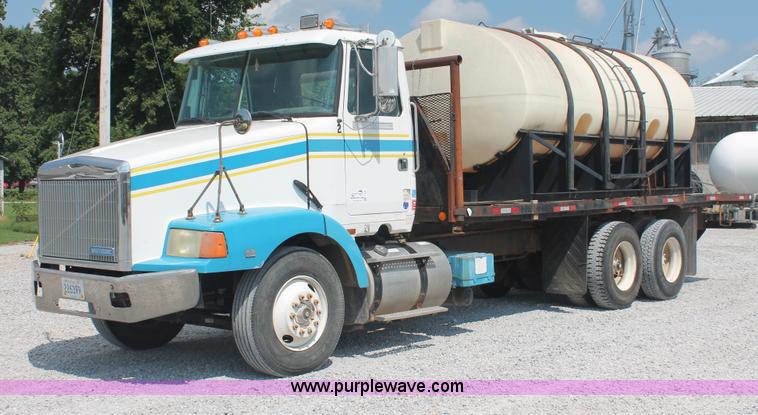 image for item I7876 1994 Volvo WG flatbed liquid nurse truck