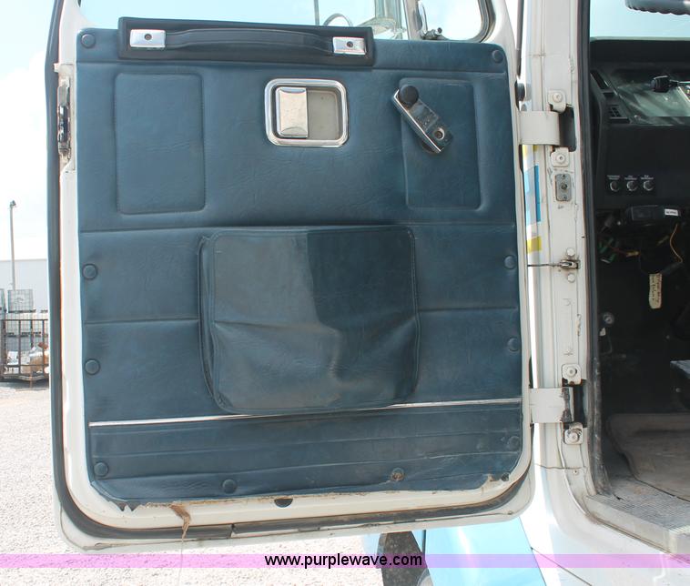 image for item I7876 1994 Volvo WG flatbed liquid nurse truck