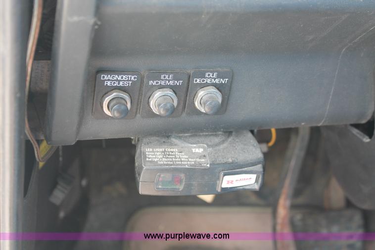 image for item I7876 1994 Volvo WG flatbed liquid nurse truck