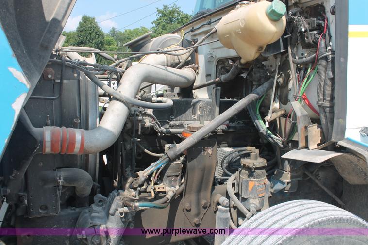 image for item I7876 1994 Volvo WG flatbed liquid nurse truck