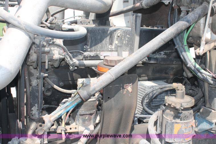 image for item I7876 1994 Volvo WG flatbed liquid nurse truck