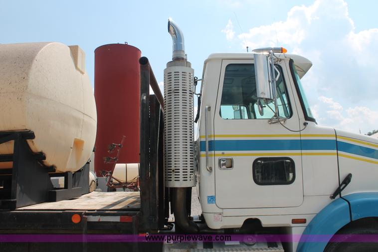 image for item I7876 1994 Volvo WG flatbed liquid nurse truck