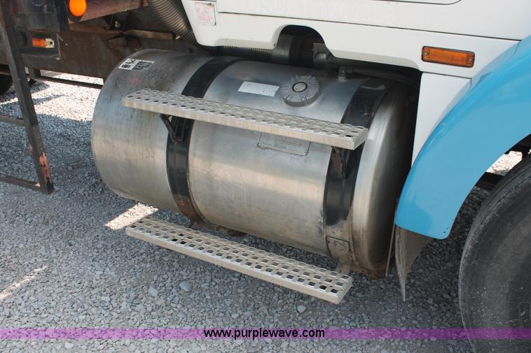 image for item I7876 1994 Volvo WG flatbed liquid nurse truck