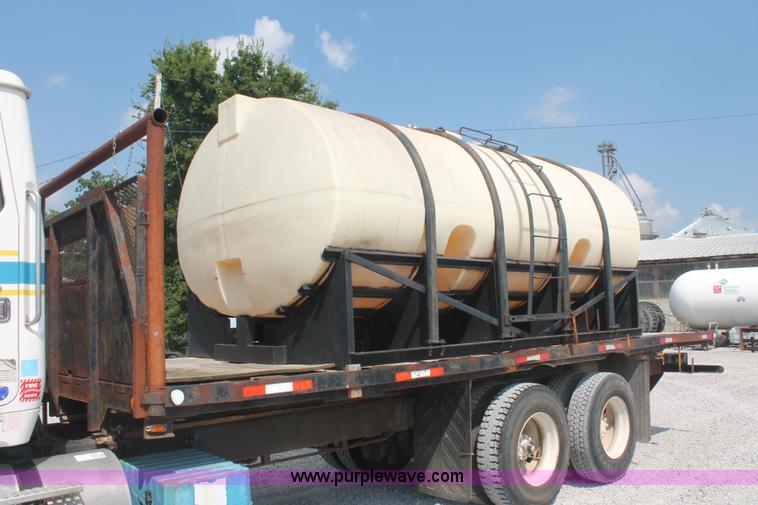 image for item I7876 1994 Volvo WG flatbed liquid nurse truck