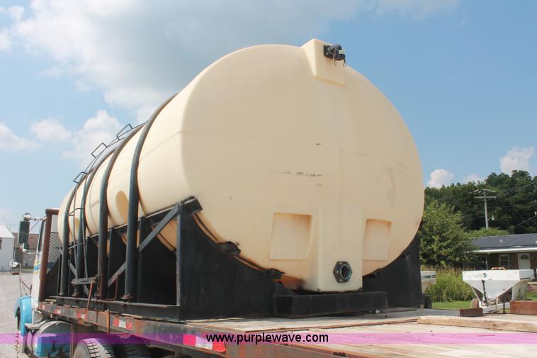 image for item I7876 1994 Volvo WG flatbed liquid nurse truck