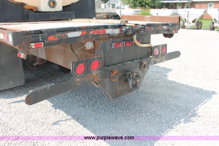 image for item I7876 1994 Volvo WG flatbed liquid nurse truck