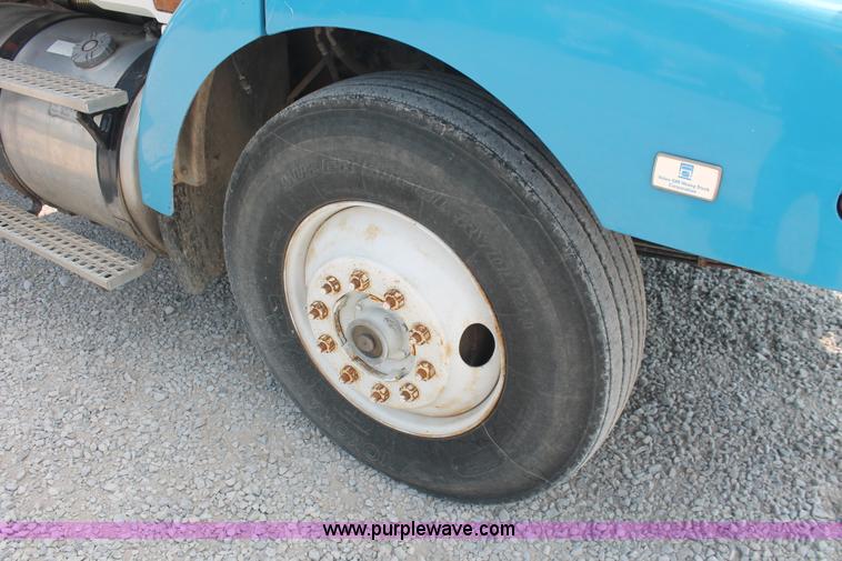 image for item I7876 1994 Volvo WG flatbed liquid nurse truck