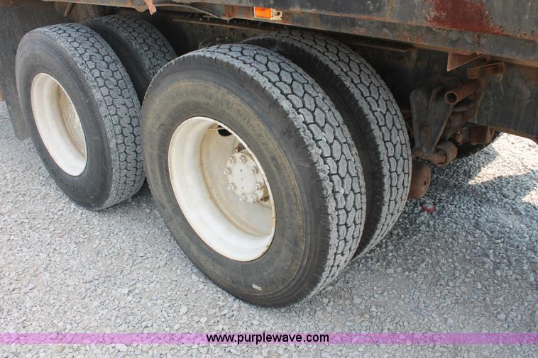 image for item I7876 1994 Volvo WG flatbed liquid nurse truck