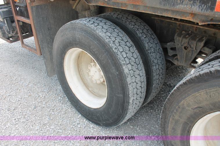 image for item I7876 1994 Volvo WG flatbed liquid nurse truck