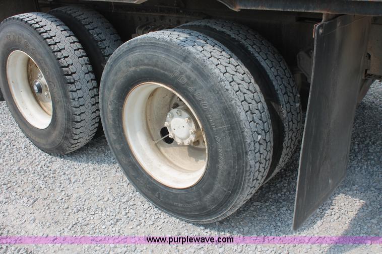 image for item I7876 1994 Volvo WG flatbed liquid nurse truck