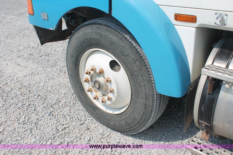 image for item I7876 1994 Volvo WG flatbed liquid nurse truck