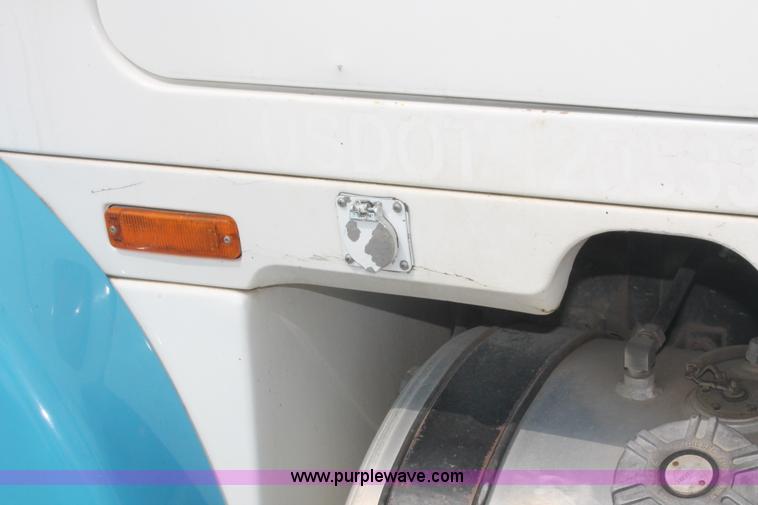 image for item I7876 1994 Volvo WG flatbed liquid nurse truck