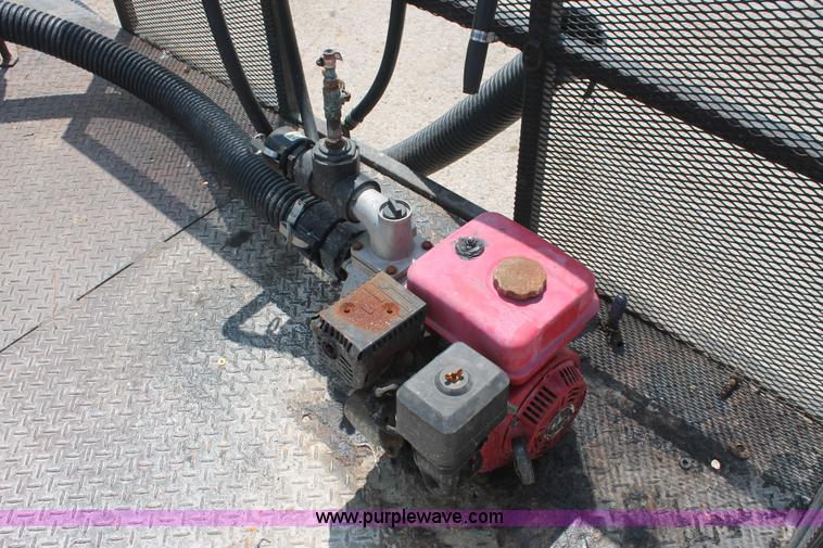 image for item I7887 1988 International F-2375 flatbed water truck