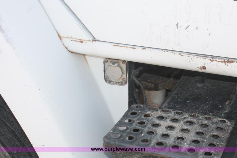 image for item I7887 1988 International F-2375 flatbed water truck