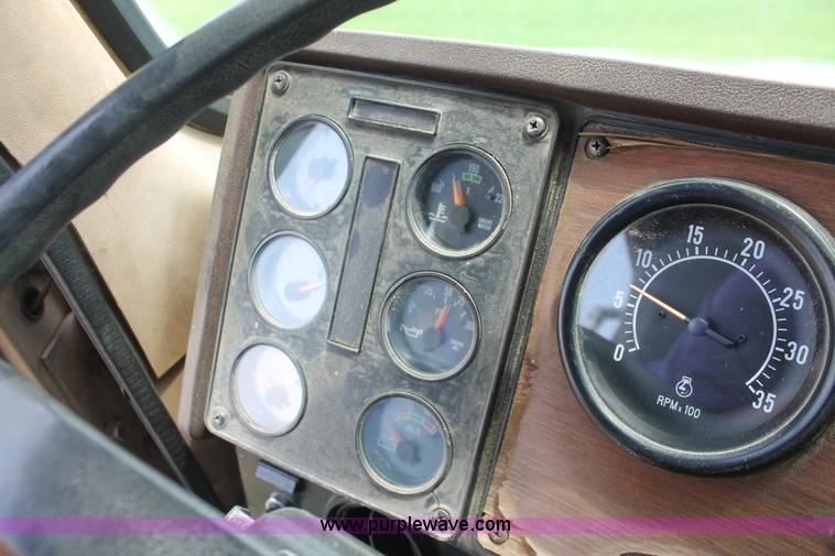 image for item I7895 1982 International Eagle cab over tri axle flatbed truck