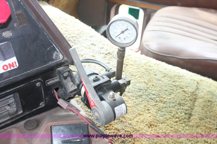 image for item I7895 1982 International Eagle cab over tri axle flatbed truck