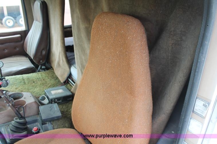 image for item I7895 1982 International Eagle cab over tri axle flatbed truck