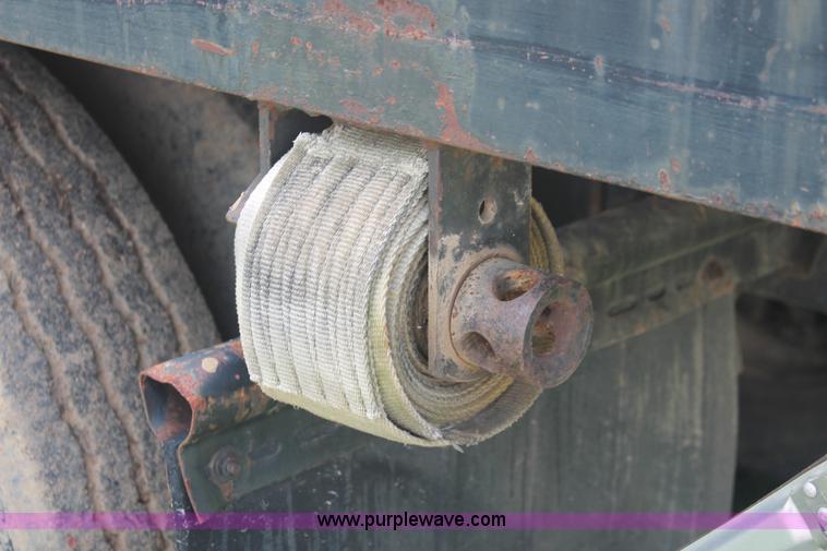 image for item I7895 1982 International Eagle cab over tri axle flatbed truck