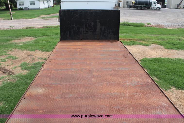 image for item I7895 1982 International Eagle cab over tri axle flatbed truck