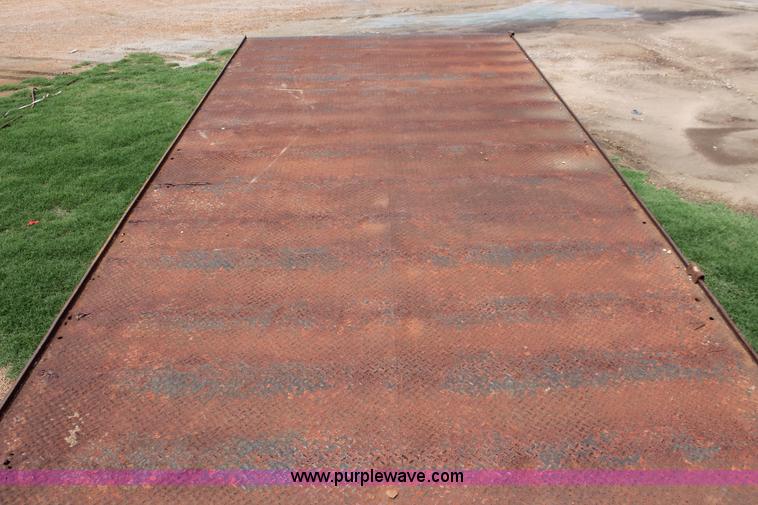 image for item I7895 1982 International Eagle cab over tri axle flatbed truck