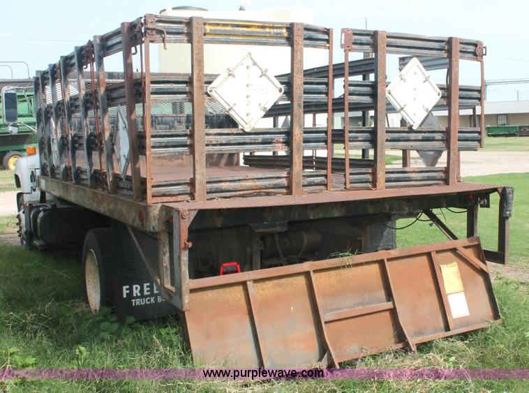 image for item I7913 1994 GMC TopKick Lo-Pro C6000 stake bed truck