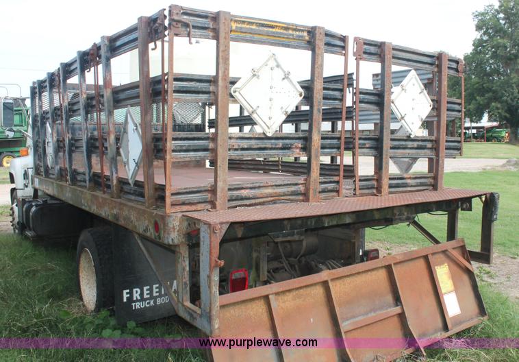 image for item I7913 1994 GMC TopKick Lo-Pro C6000 stake bed truck