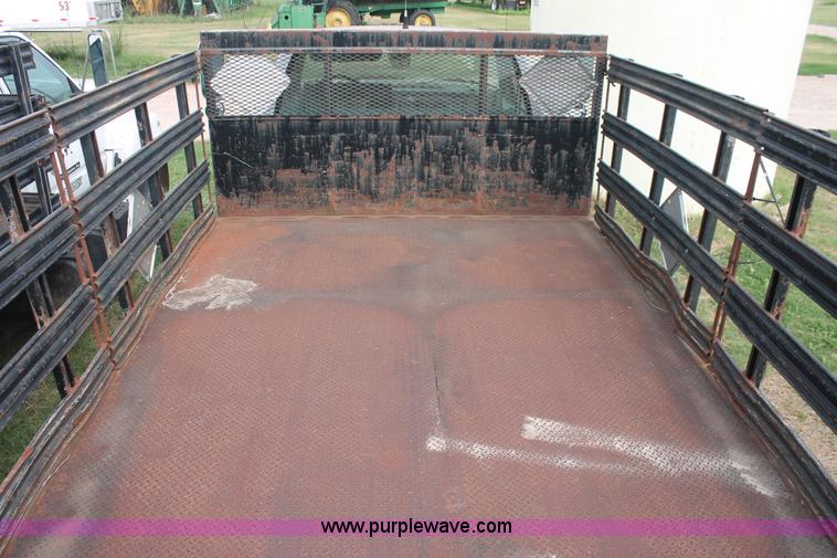 image for item I7913 1994 GMC TopKick Lo-Pro C6000 stake bed truck