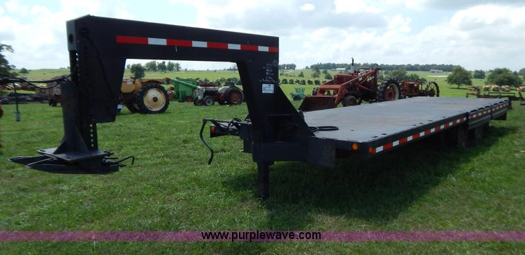 image for item G3348 1973 28' tilt deck trailer