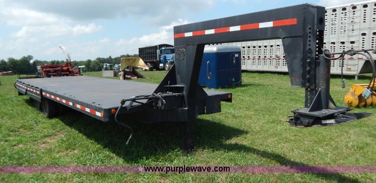 image for item G3348 1973 28' tilt deck trailer