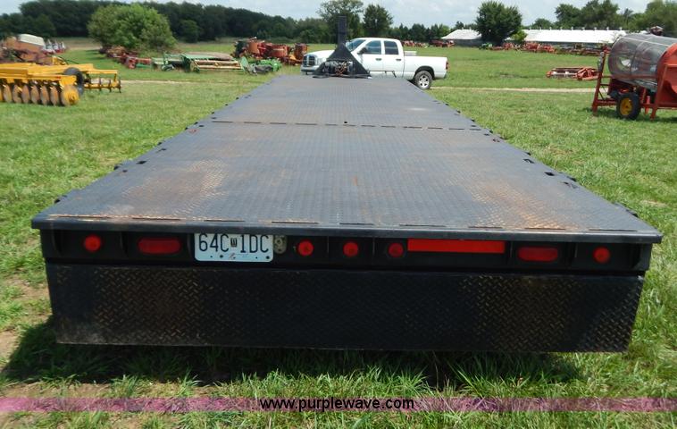 image for item G3348 1973 28' tilt deck trailer
