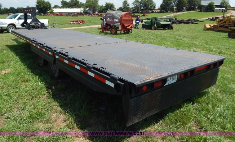 image for item G3348 1973 28' tilt deck trailer