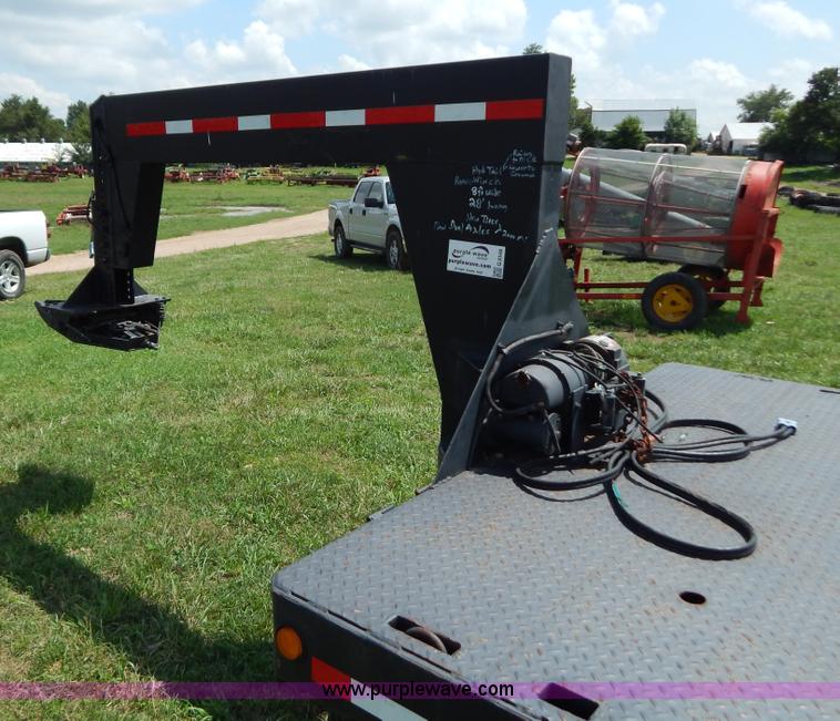 image for item G3348 1973 28' tilt deck trailer