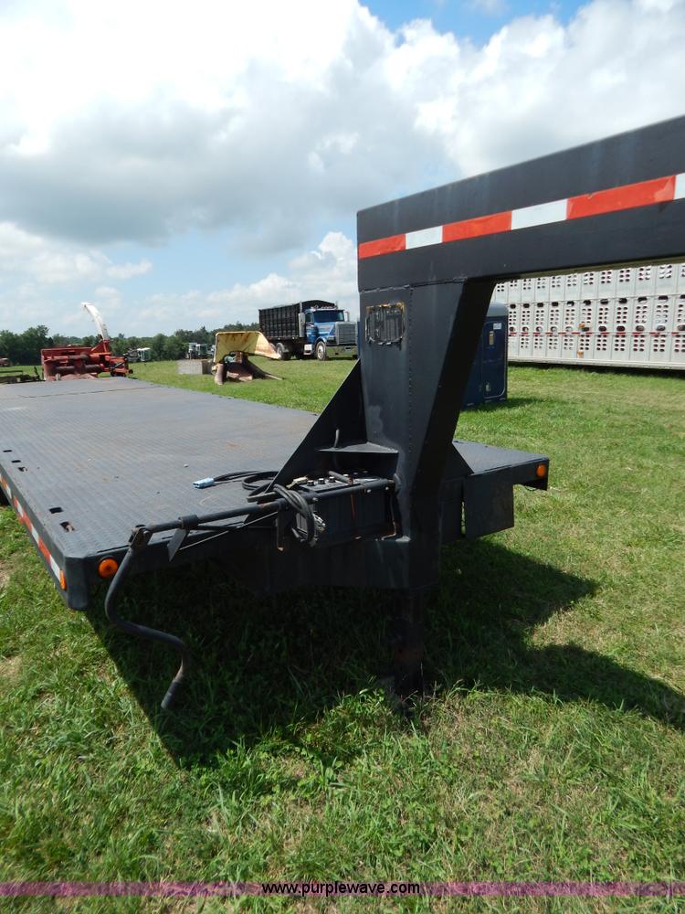 image for item G3348 1973 28' tilt deck trailer