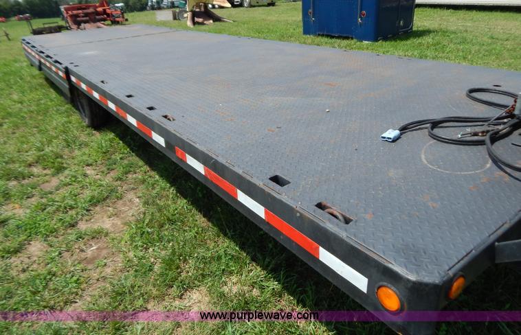 image for item G3348 1973 28' tilt deck trailer