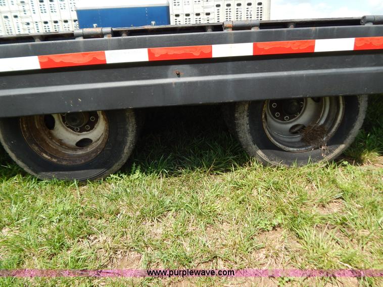 image for item G3348 1973 28' tilt deck trailer