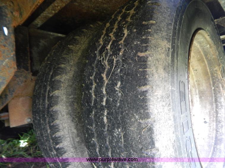 image for item G3348 1973 28' tilt deck trailer