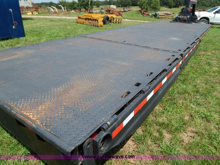 image for item G3348 1973 28' tilt deck trailer