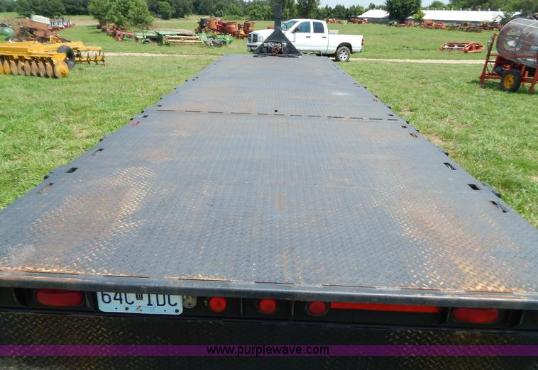 image for item G3348 1973 28' tilt deck trailer