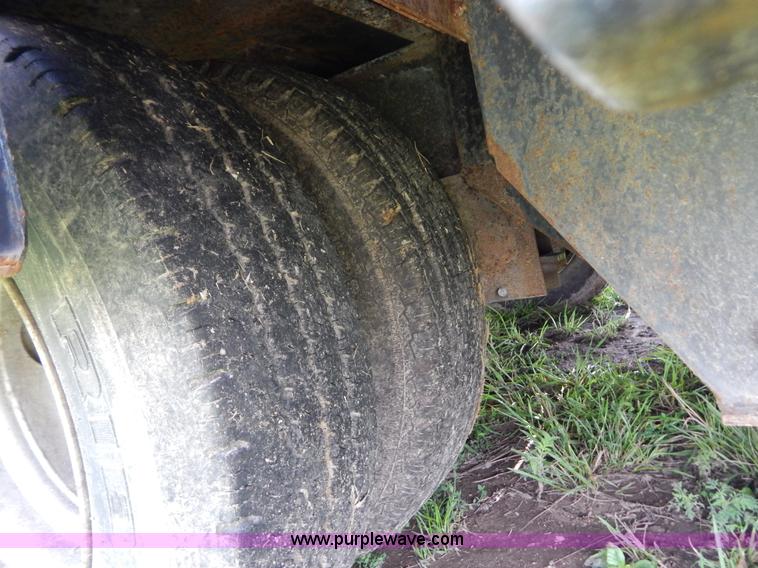 image for item G3348 1973 28' tilt deck trailer