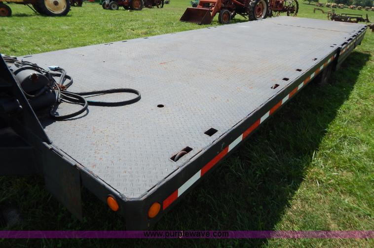 image for item G3348 1973 28' tilt deck trailer