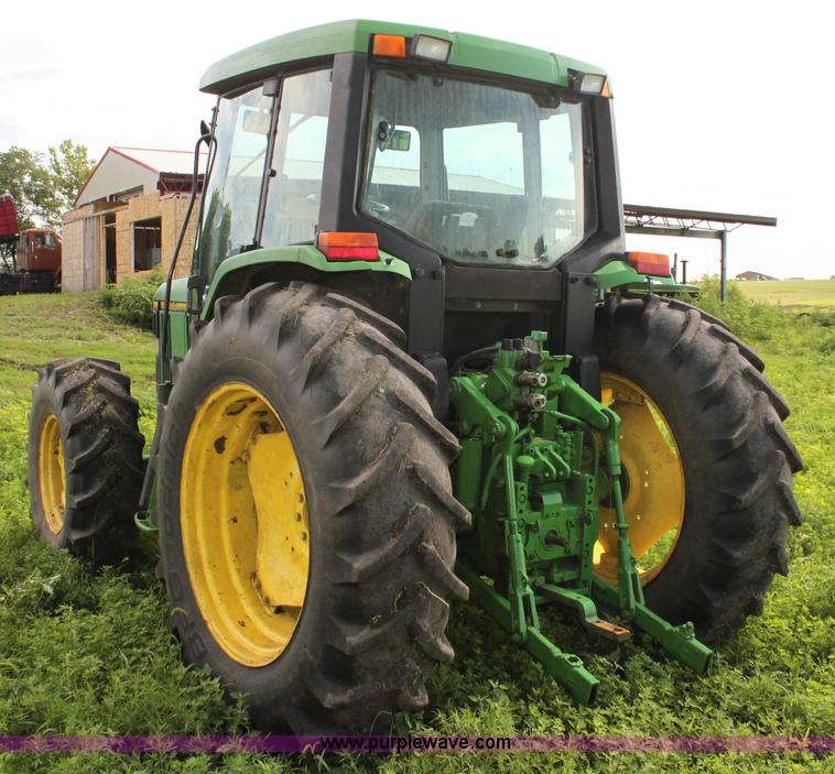 image for item G4056 1996 John Deere 6400 MFWD tractor