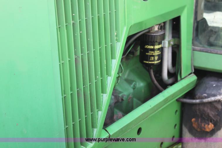 image for item G4056 1996 John Deere 6400 MFWD tractor