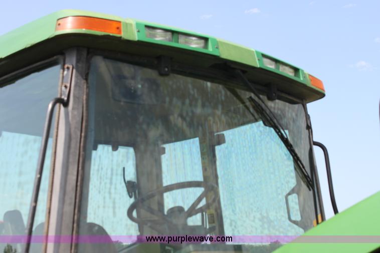 image for item G4056 1996 John Deere 6400 MFWD tractor