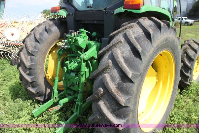 image for item G4056 1996 John Deere 6400 MFWD tractor