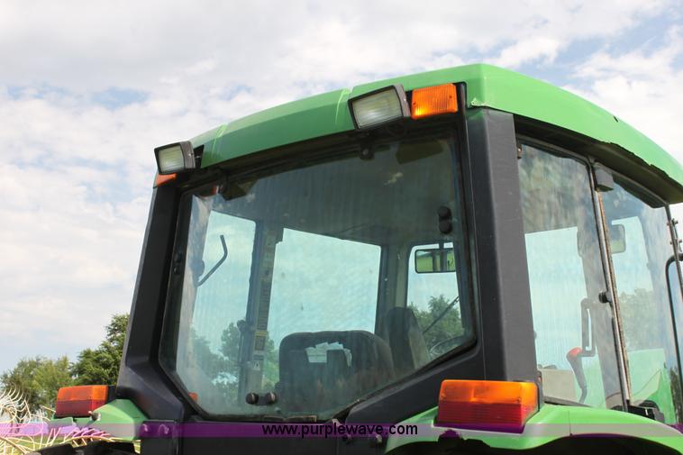 image for item G4056 1996 John Deere 6400 MFWD tractor