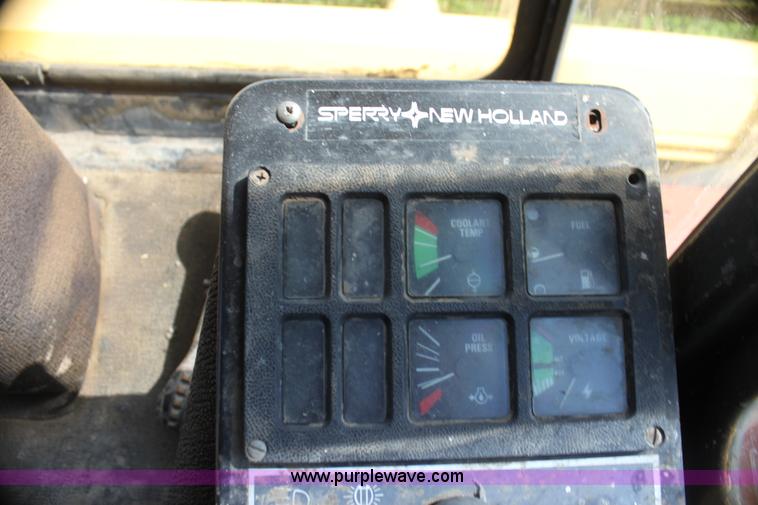 image for item G4058 1985 New Holland 1116 Speedrower self-propelled swather