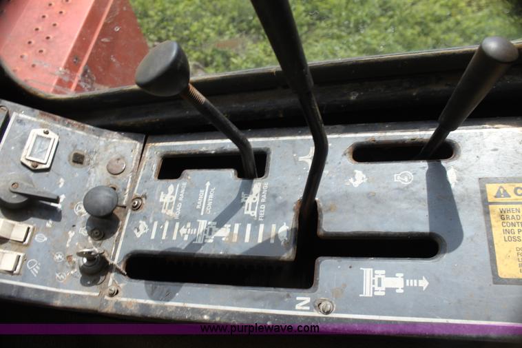 image for item G4058 1985 New Holland 1116 Speedrower self-propelled swather