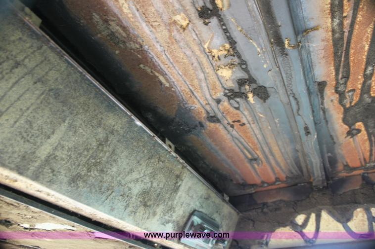 image for item G4058 1985 New Holland 1116 Speedrower self-propelled swather