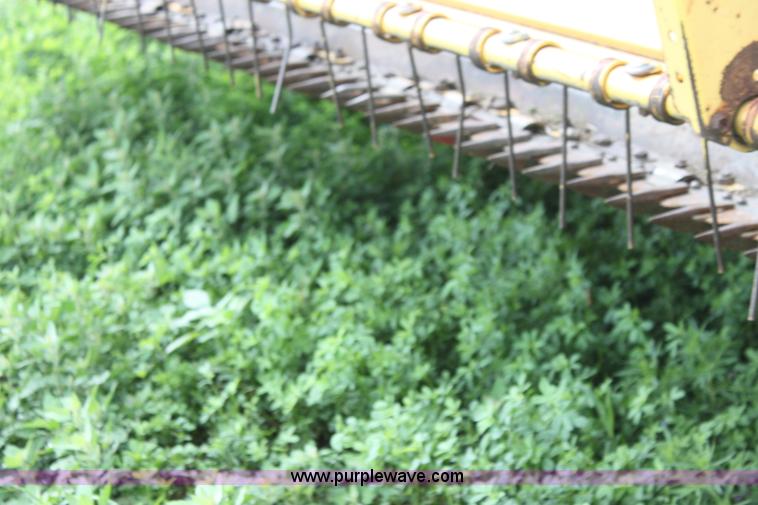 image for item G4058 1985 New Holland 1116 Speedrower self-propelled swather